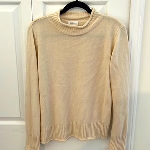 Cream turtle neck sweater in size medium